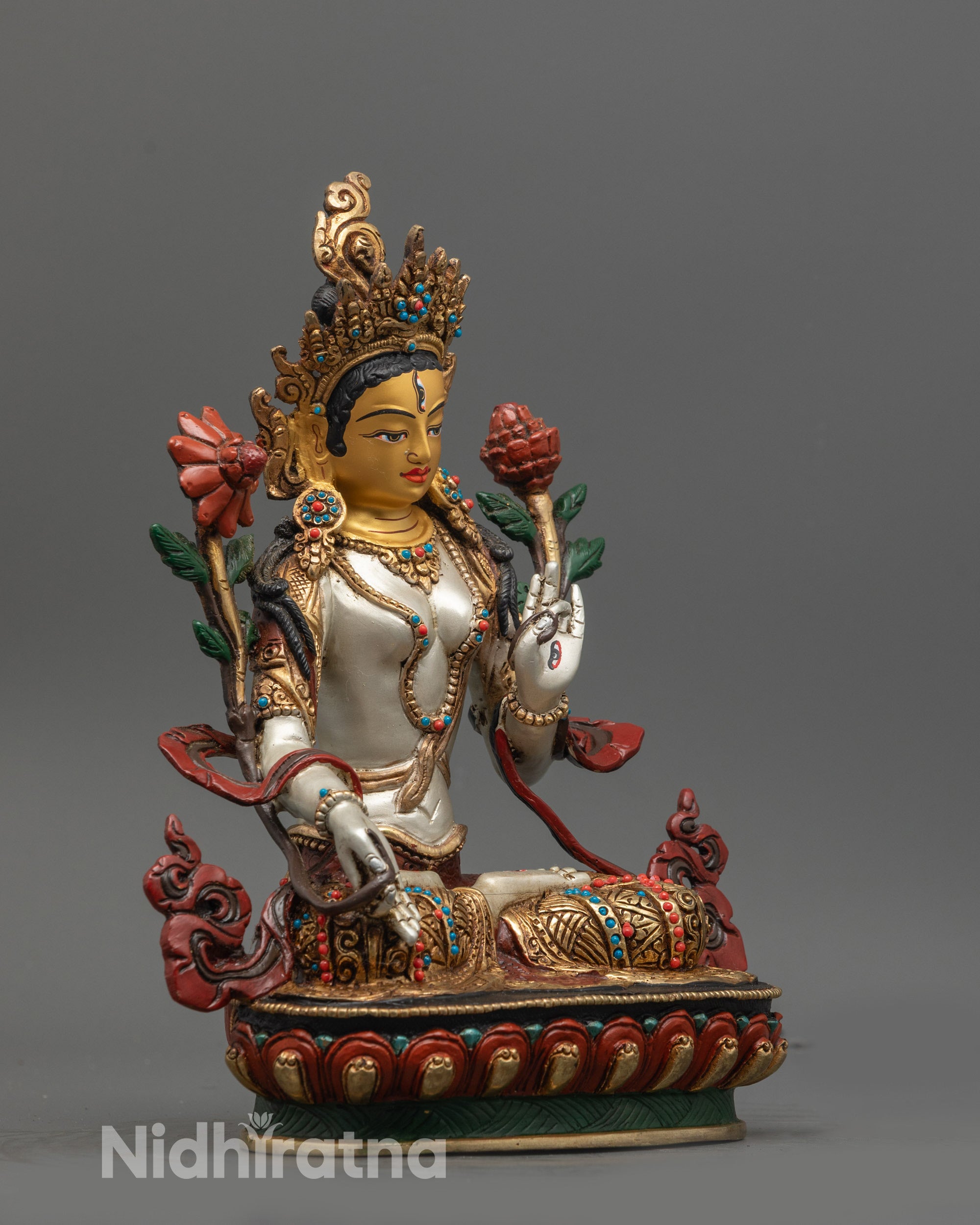 Side view of White Tara Statue – Hand-carved lotus seat