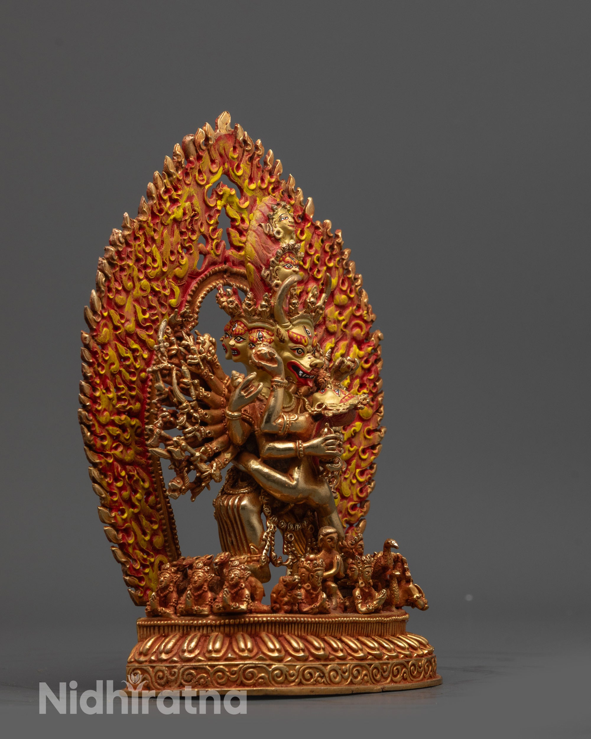 Side view of Yamantaka Yab-Yum with Vajravetali standing on lotus seat with sacred symbols