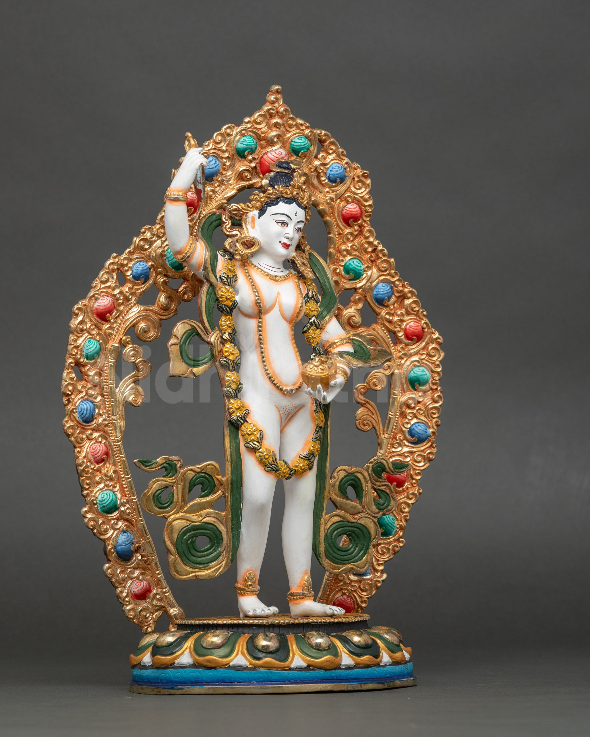 Side view of Yeshe Tsogyal holding kartika knife and kapala, Nepalese altar sculpture
