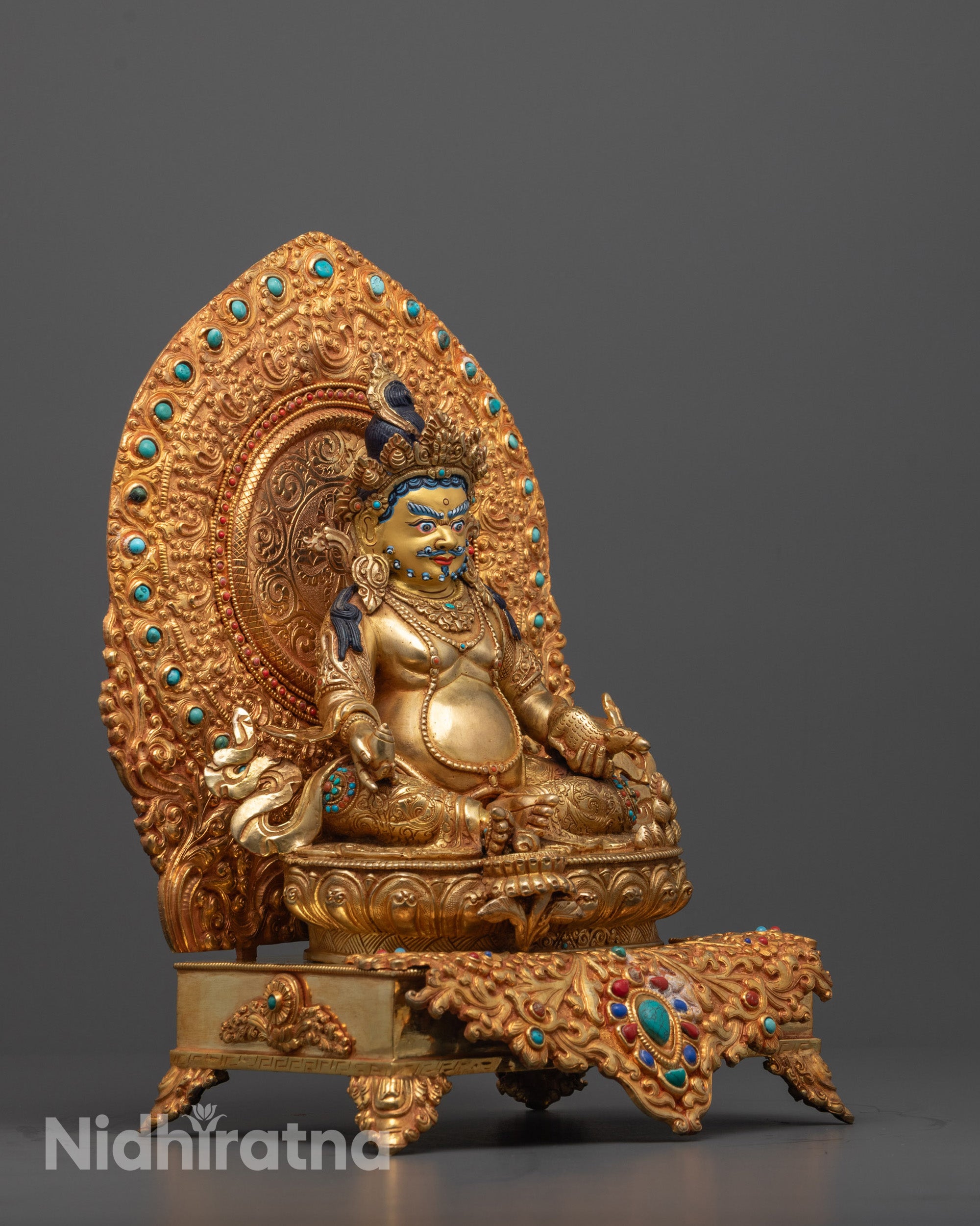 Side view of copper Dzambhala Statue showing intricate craftsmanship and traditional Himalayan details