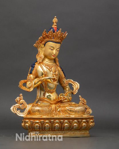Side view of gold-gilded Vajrasattva statue for spiritual purification and Vajrayana practice