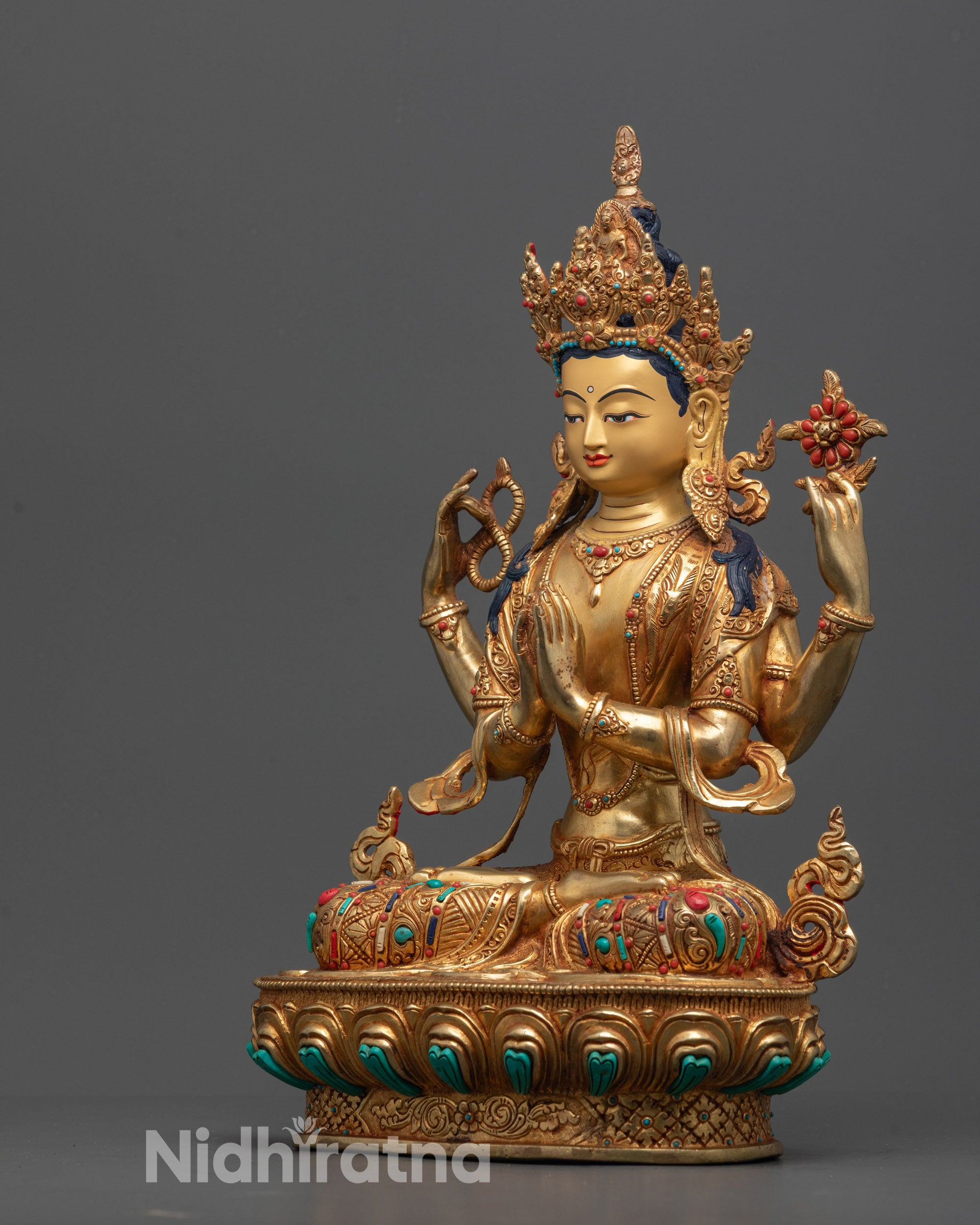 Side view of hand-carved Chenrezig Statue from Nepal showing profile, lotus seat,