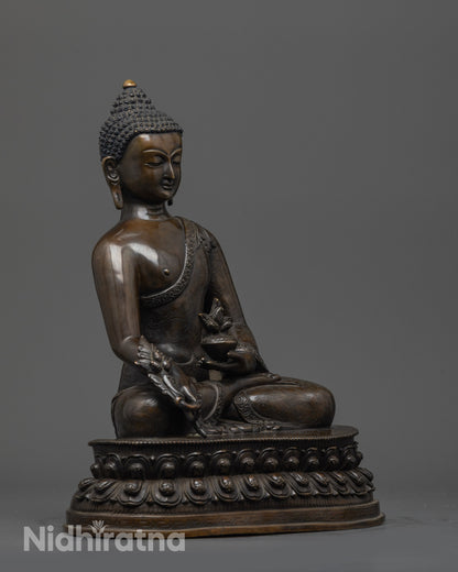 Side view of handcrafted Bhaisajyaguru Buddha Statue with earthy hue details