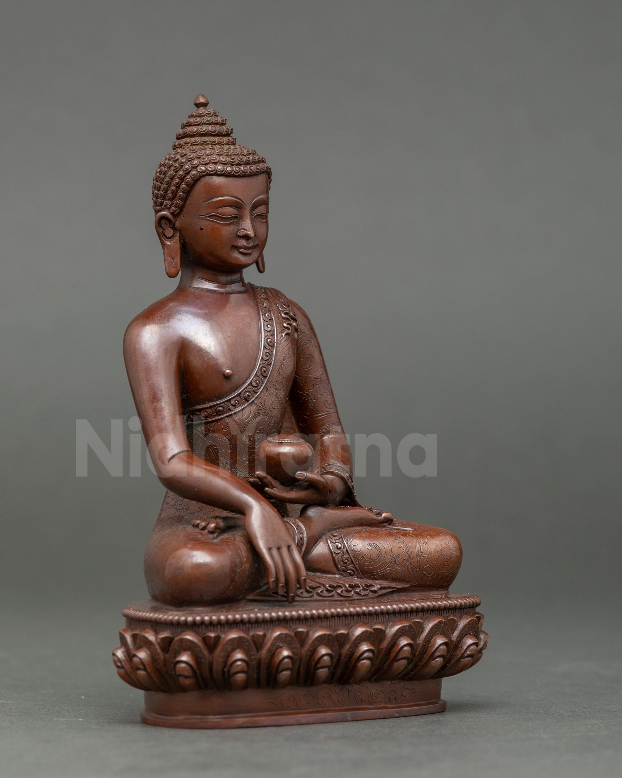 Side view of handcrafted Shakyamuni Buddha statue for meditation and spiritual focus