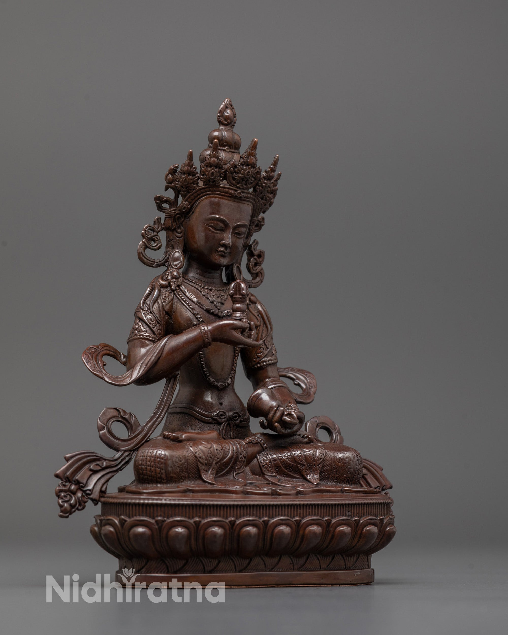 Side angle of Vajrasattva statue highlighting smooth symmetry and spiritual expression
