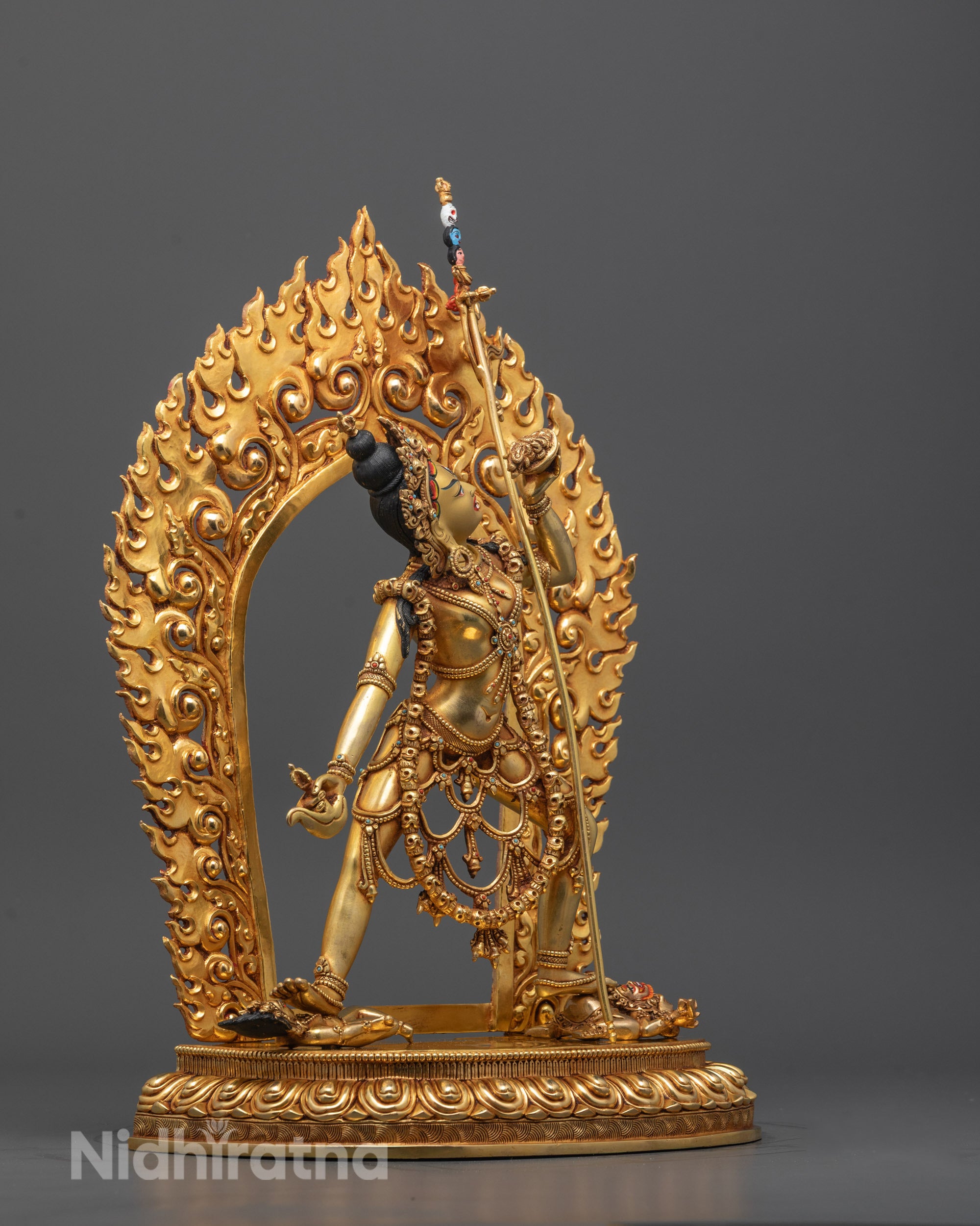 Side view of handcrafted Vajrayogini sculpture with halo