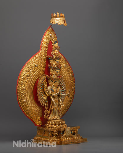 Side view of intricately detailed Chenrezig Statue showing multiple arms and divine halo