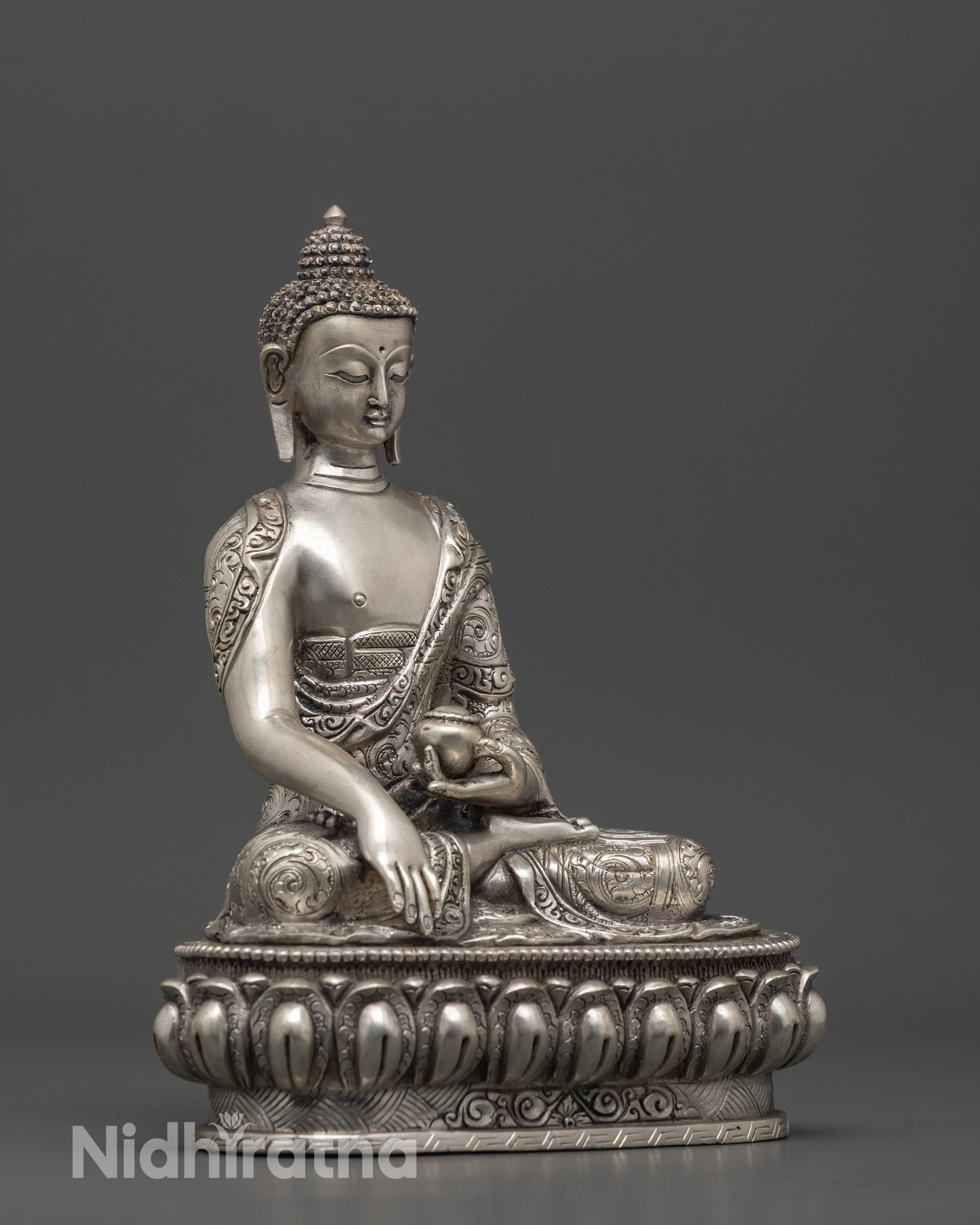 Side view of intricately detailed Shakyamuni Buddha Statue with silver plating
