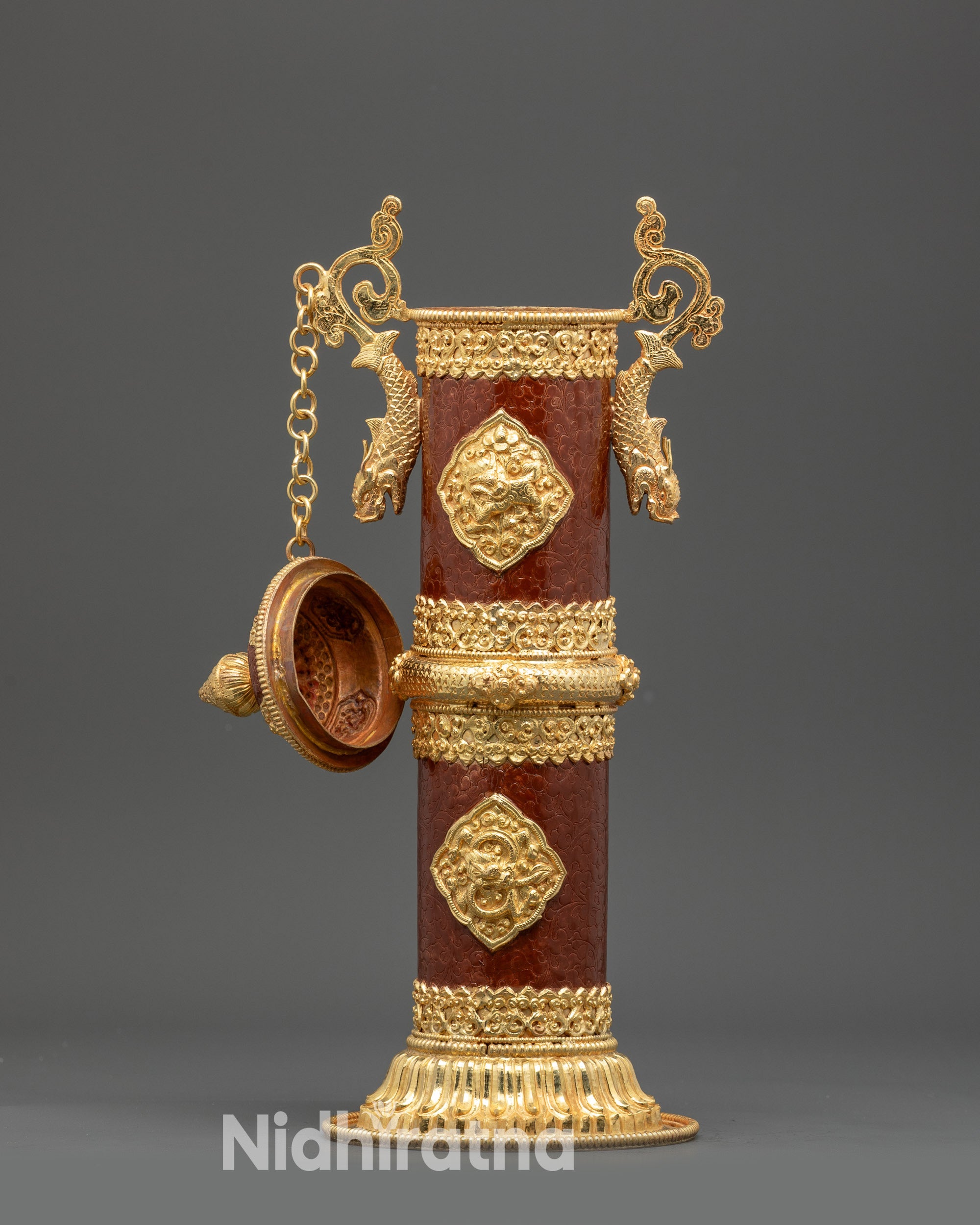 Side view of lotus petal borders on hand-painted copper incense holder