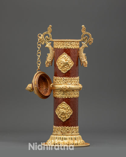 Side view of lotus petal borders on hand-painted copper incense holder