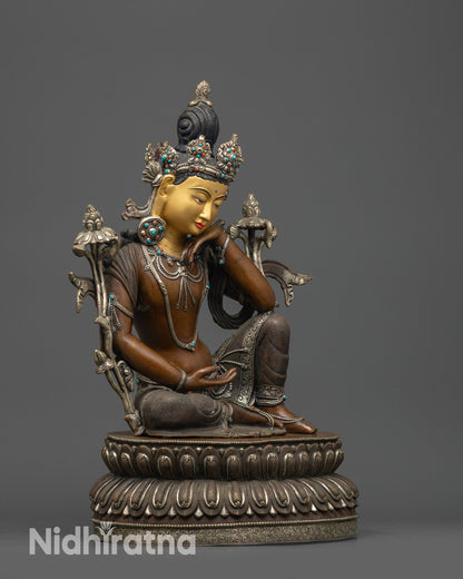 Side view of oxidized Avalokiteshvara Statue showing silver-plated swirling robe patterns
