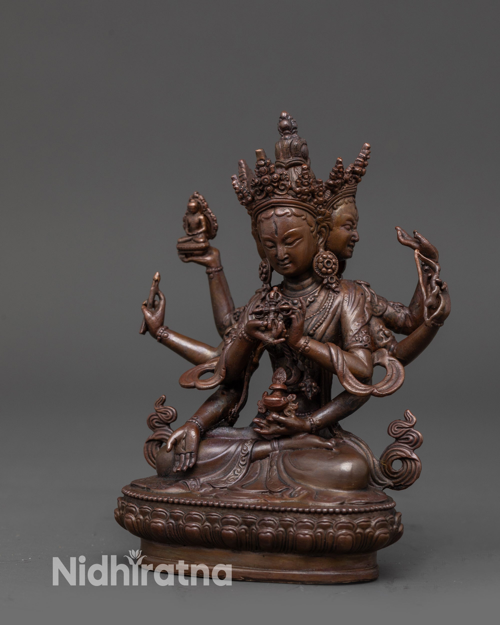 Side view of oxidized copper Namgyalma Sculpture showing flowing robes and intricate electroplated craftsmanship