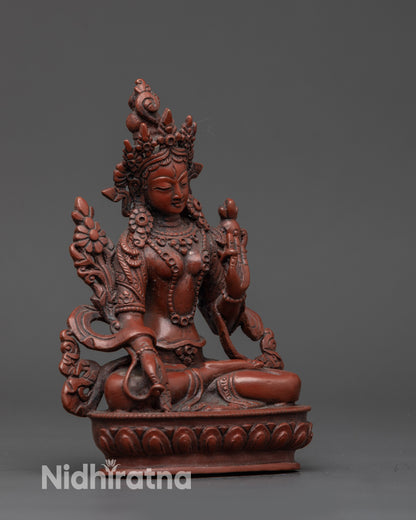 Side view of oxidized copper Sapta Lochani Statue with flowing robes and mudra hands
