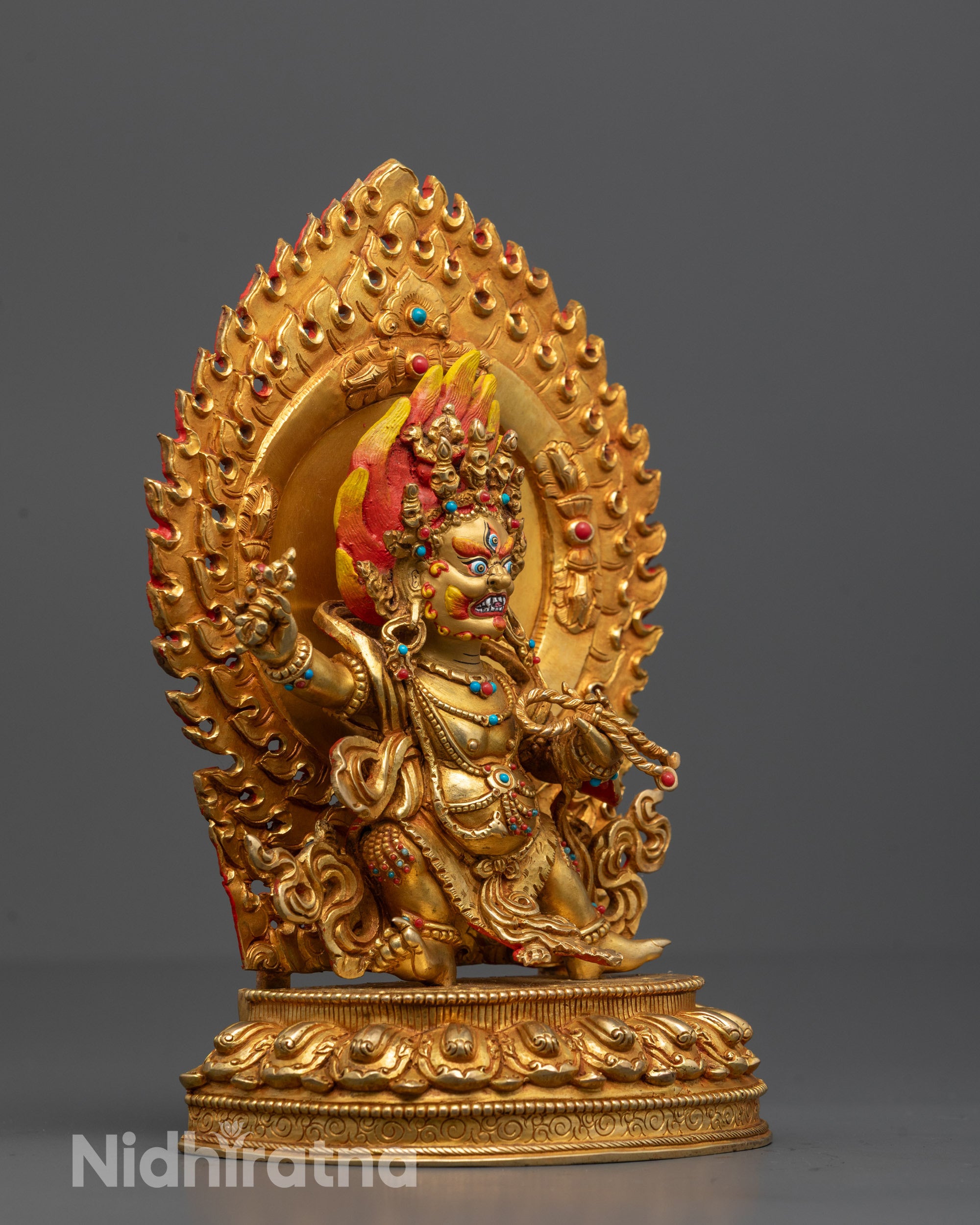 Side view of partially 24k gold gilded Vajrapani Statue made from premium copper