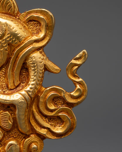 Side view of the Golden Fish symbol from the handcrafted Tibetan Buddhist Ashtamangala set