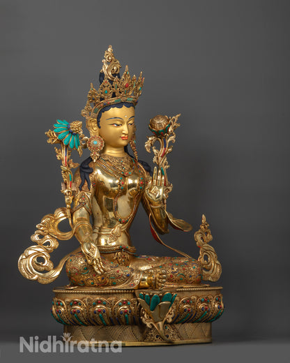 Side view of traditional Green Tara Sculpture made in Nepal using lost-wax method