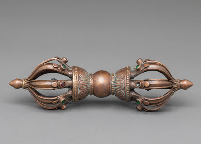 Side view oxidized copper Vajra with intricate patterns, Tibetan Buddhist ritual instrument
