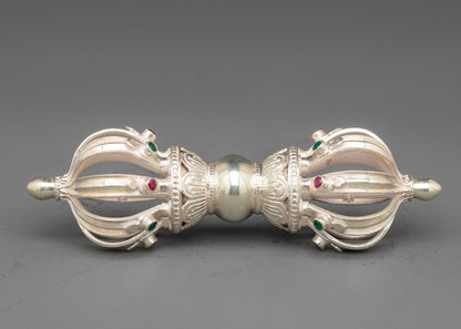 Side view pure silver vajra intricate patterns symbolizing strength spiritual power