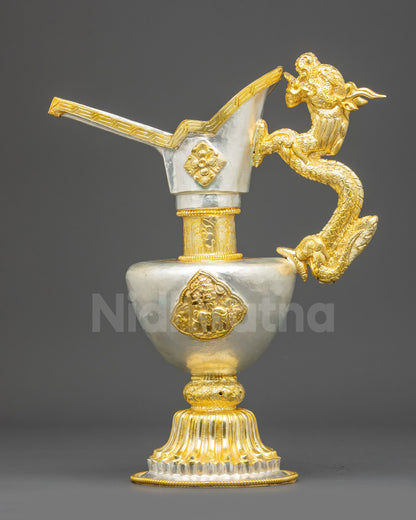 Side view ritual Bumba with long spout, embossed symbols, Vajrayana water offering vessel