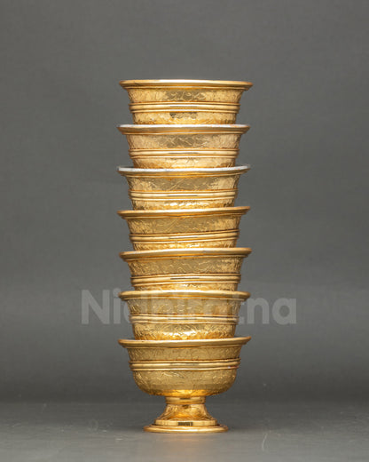 Side view seven bowl water offering set for Tibetan Buddhist rituals and daily puja