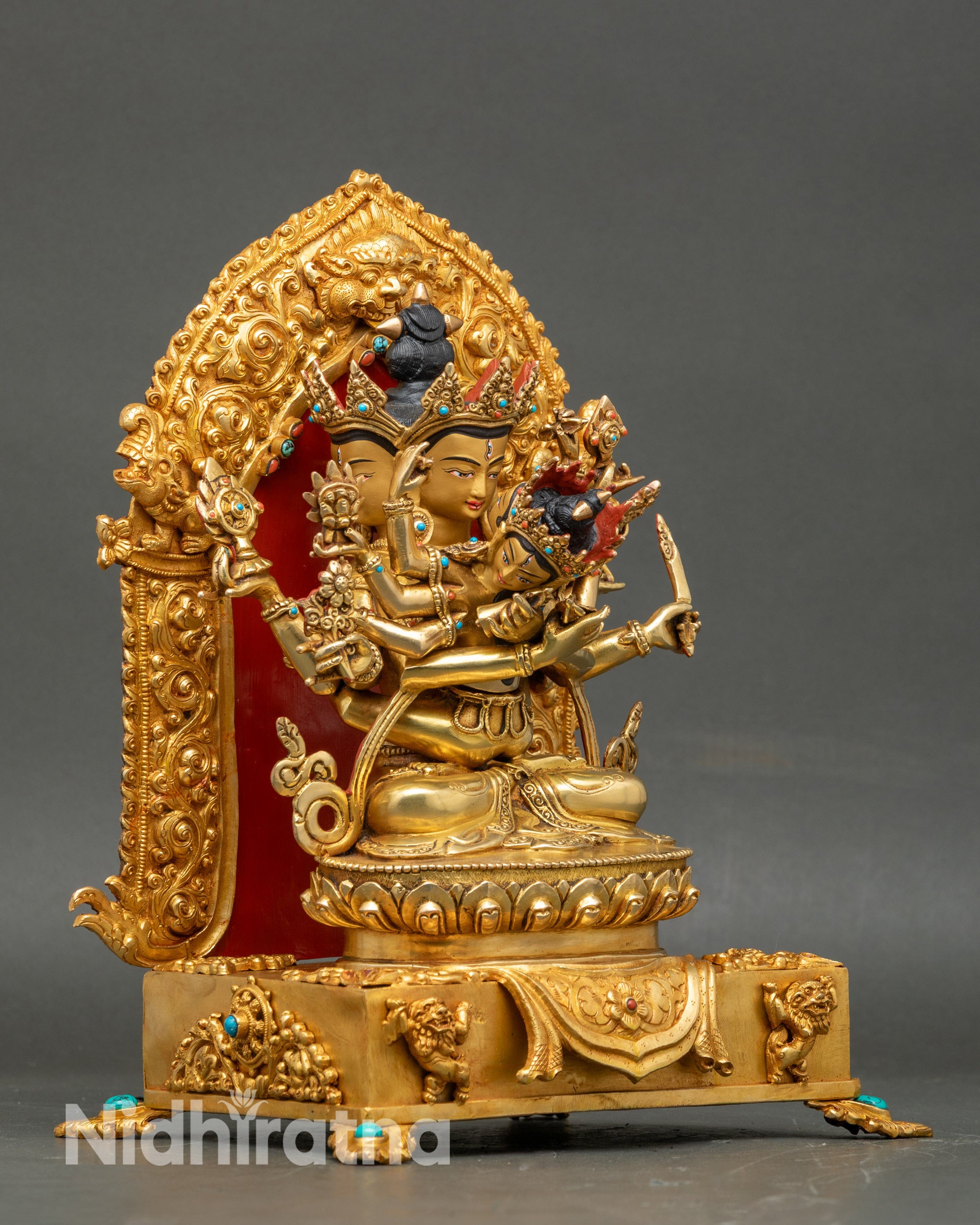 Side view six arms holding vajra bell wheel lotus jewel sword tantric dei