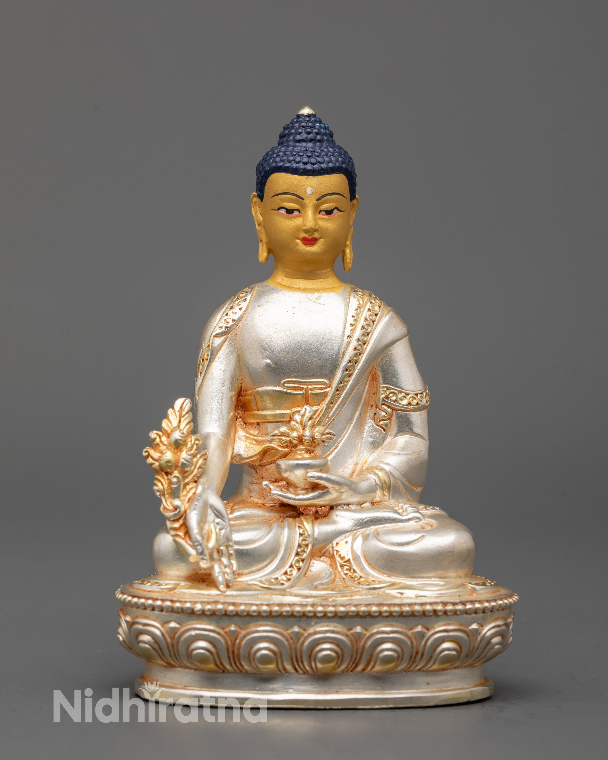 Silver-plated Medicine Buddha Statue seated on lotus with 24k gold-painted face holding
