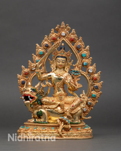 Simhada Manjushri statue on lion throne with copper and gold fire-gilded details