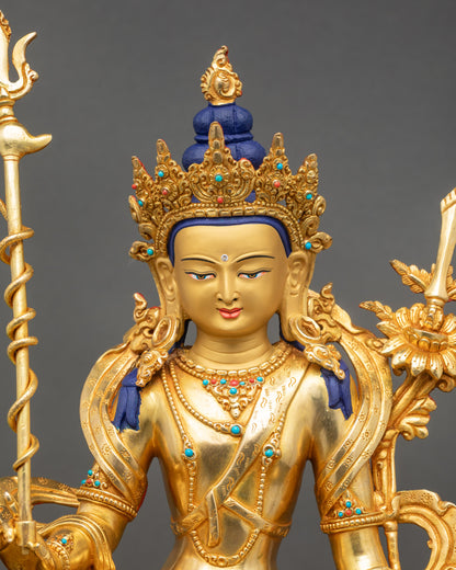 Simhada Chenrezig close-up showing gold-gilded face and jeweled crown details