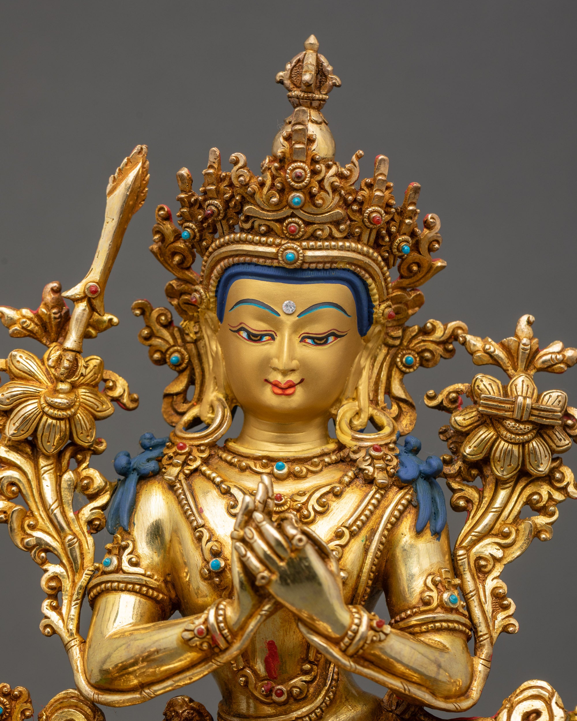 Simhada Manjushri close up of copper statue with gold fire-gilding Nepal