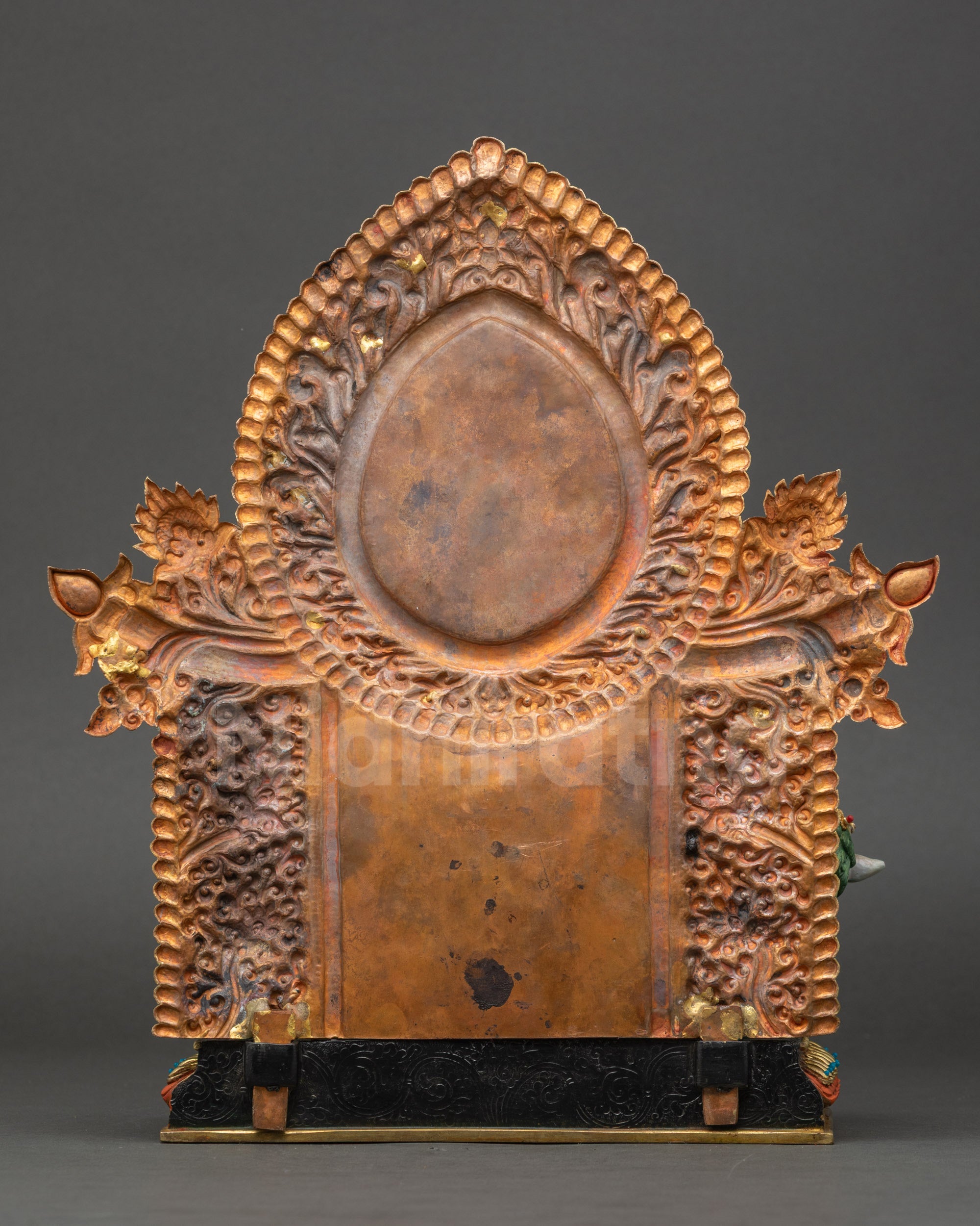 Simhanada Chenrezig Statue back view showing carved garments and halo