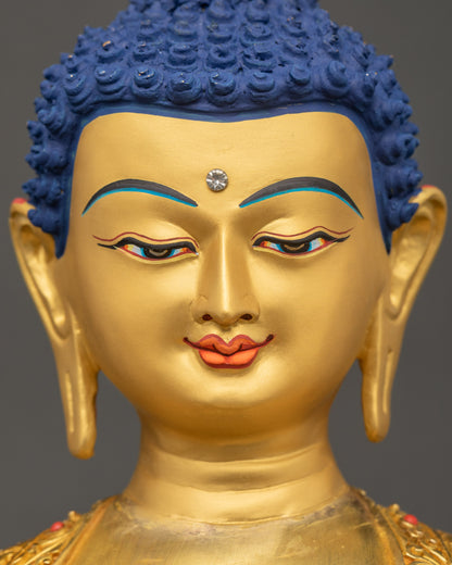 Sitting Buddha Statue serene gold-painted face detailed close up