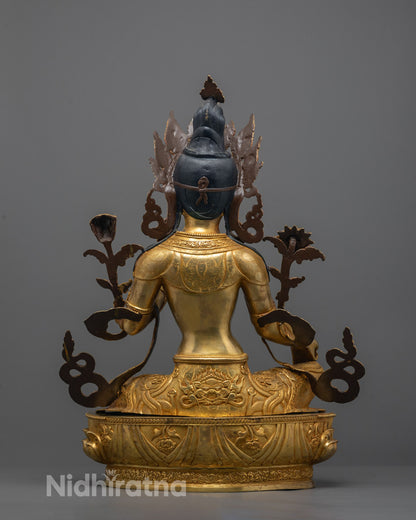 Skilled artisan from Patan Nepal creating Green Tara Statue