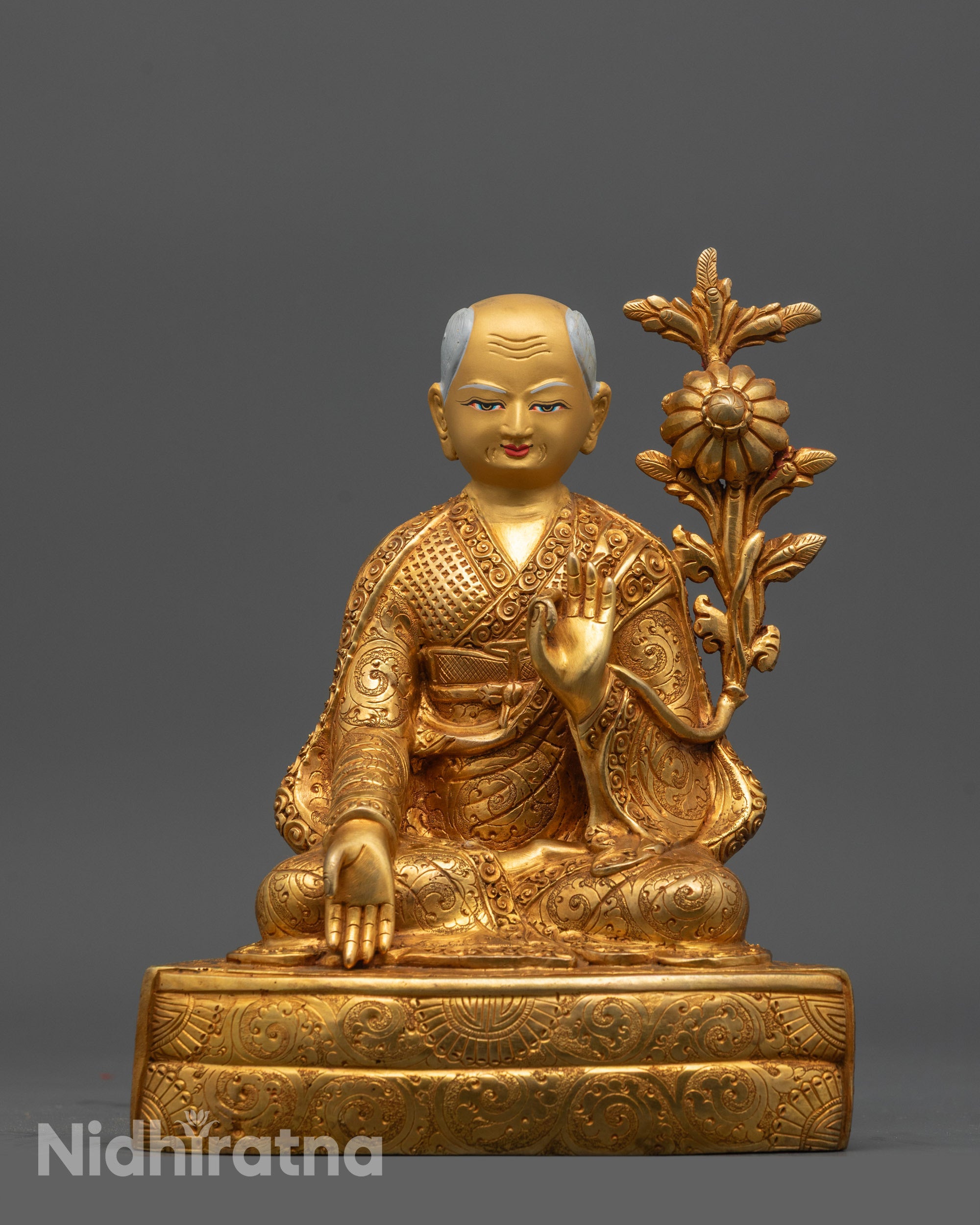 Sonam Tsemo in dharmachakra mudra with gold-plated lama robe