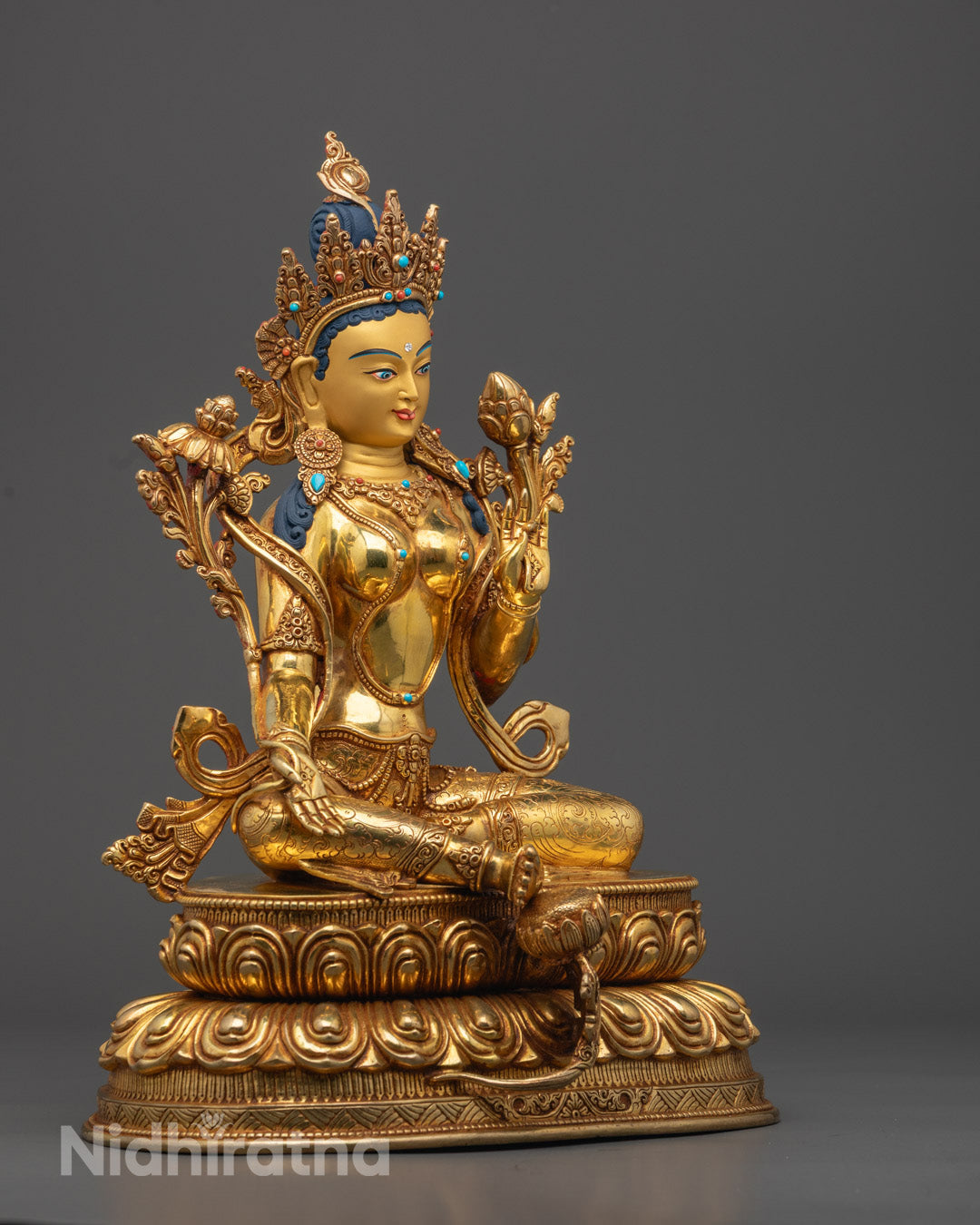 Spiritual Green Tara artwork seated on lotus throne, symbolizing protection, wisdom, and compassion