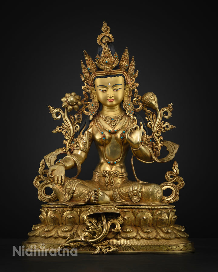 It shows full picture of gold gilded green tara statue