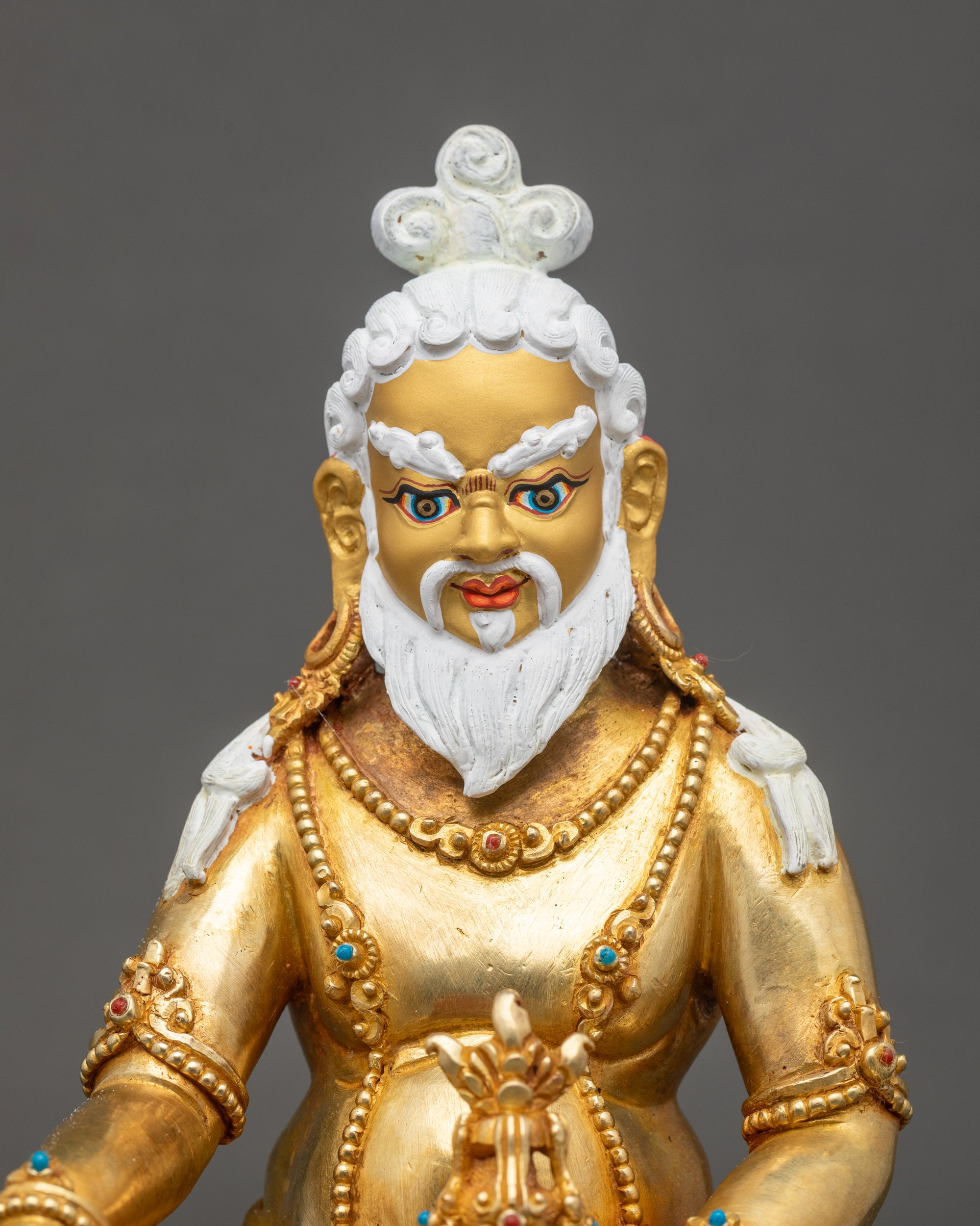 Thangtong Gyalpo statue close up handcrafted Nepalese gold-fire gilded art