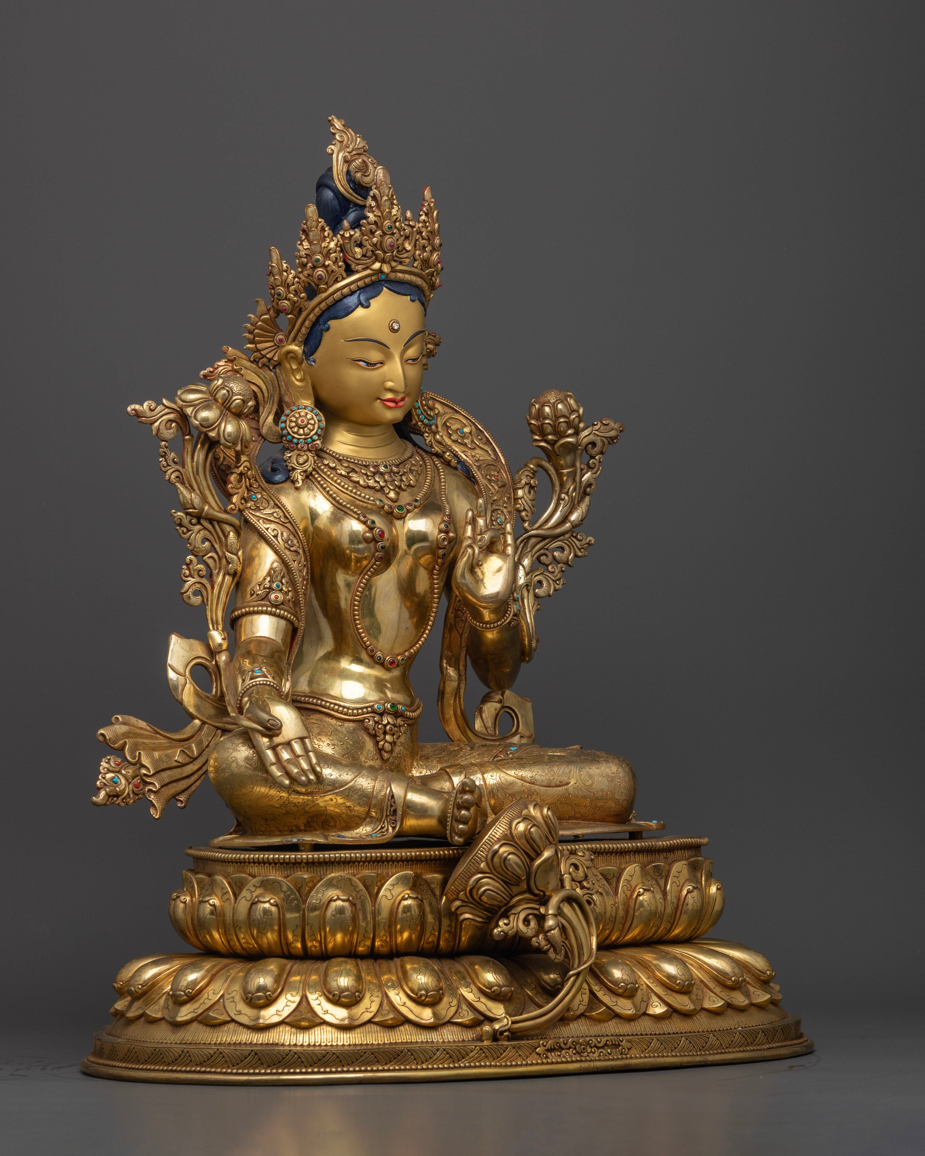 The 13.62kg Green Tara statue showcases colorful ornaments, intricate textures, and traditional Nepalese craftsmanship.