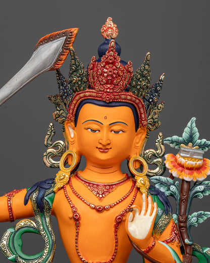 The Manjushri statue’s finely detailed face and adornments, highlighting expert Nepalese artistry and spiritual elegance.
