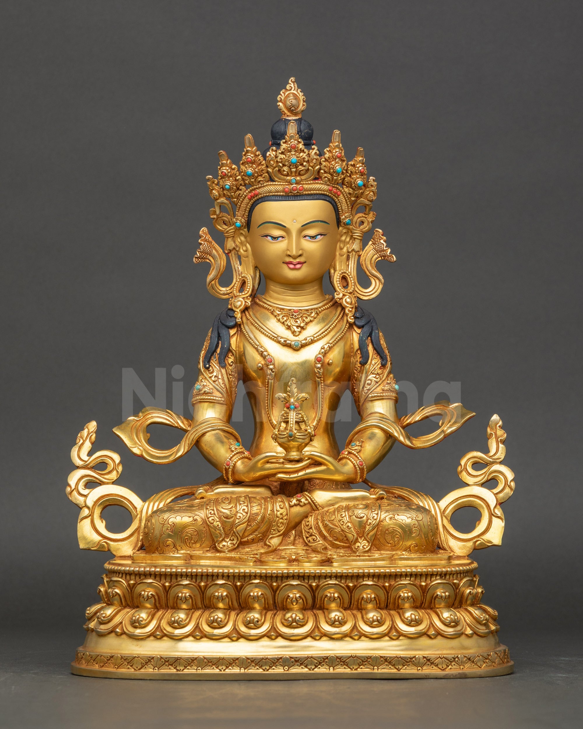 Tibetan Amitayus statue with gold-gilded face and body on lotus pedestal