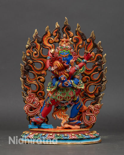 Tibetan Chakrasamvara statue with blazing halo, wrathful expression, and third eye