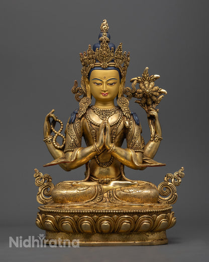 Tibetan Chenrezig Deity Statue showing pure gold-gilded face and body with vibrant acrylic colors
