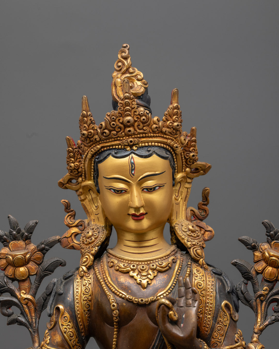  Tibetan White Tara Sculpture showing detailed gold-plated robe, floating design, and seven all-seeing eyes.