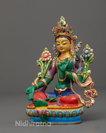 Tibetan art Green-Shade Mother Tara statue painted with rich acrylic colors symbolizing compassion protection and spiritual focus

