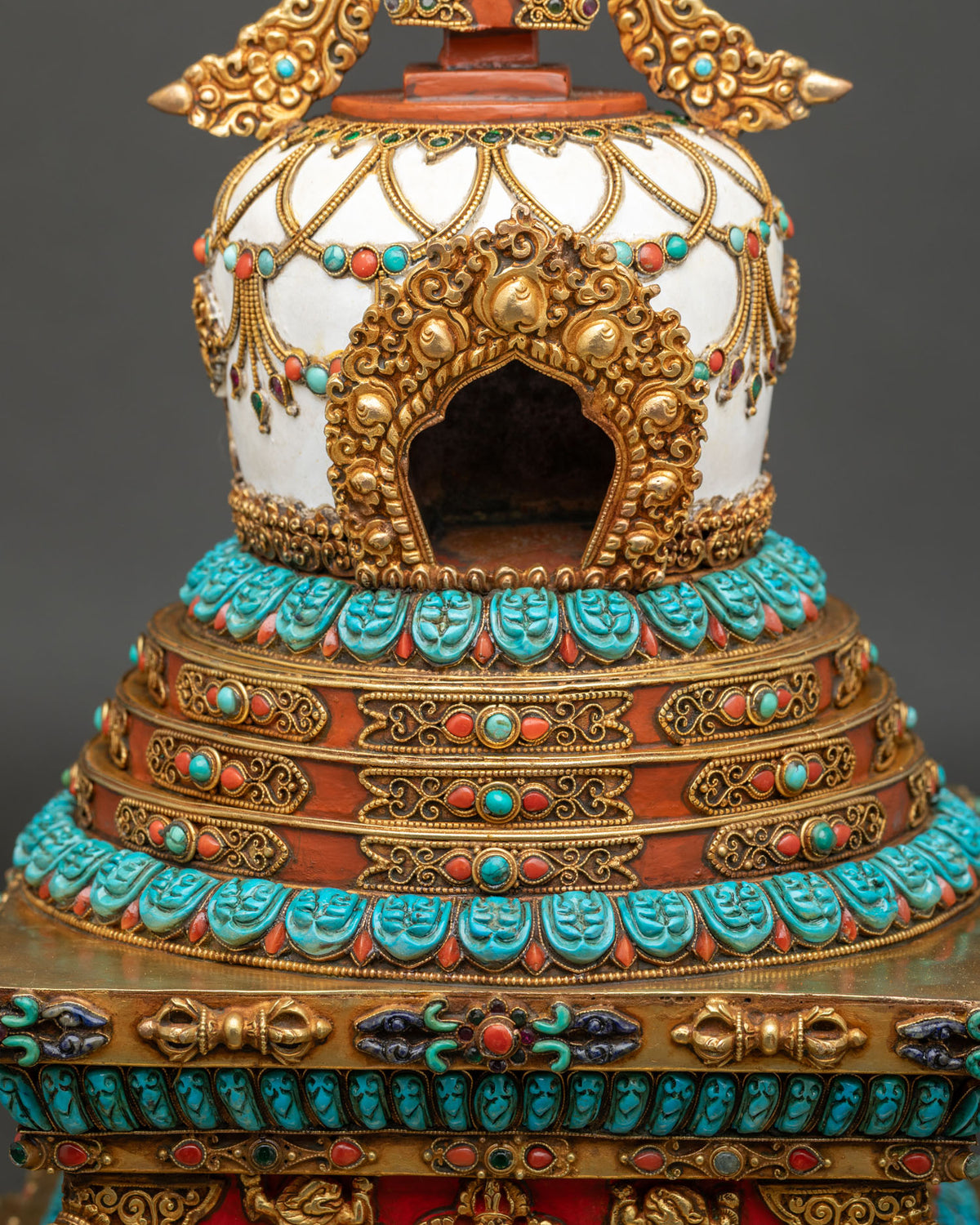 tibetan-chorten-dome-with-gold-gilded-arched-niche-and-turquoise-coral-gemstone-details-nepal-handcrafted