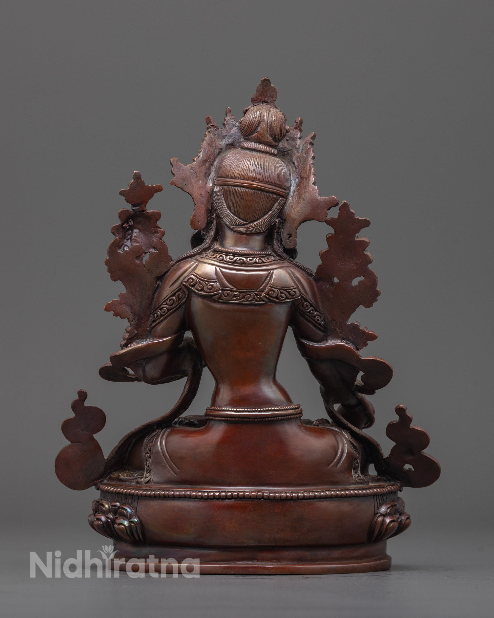 Tibetan oxidized copper White Tara sculpture featuring compassion and wisdom gestures