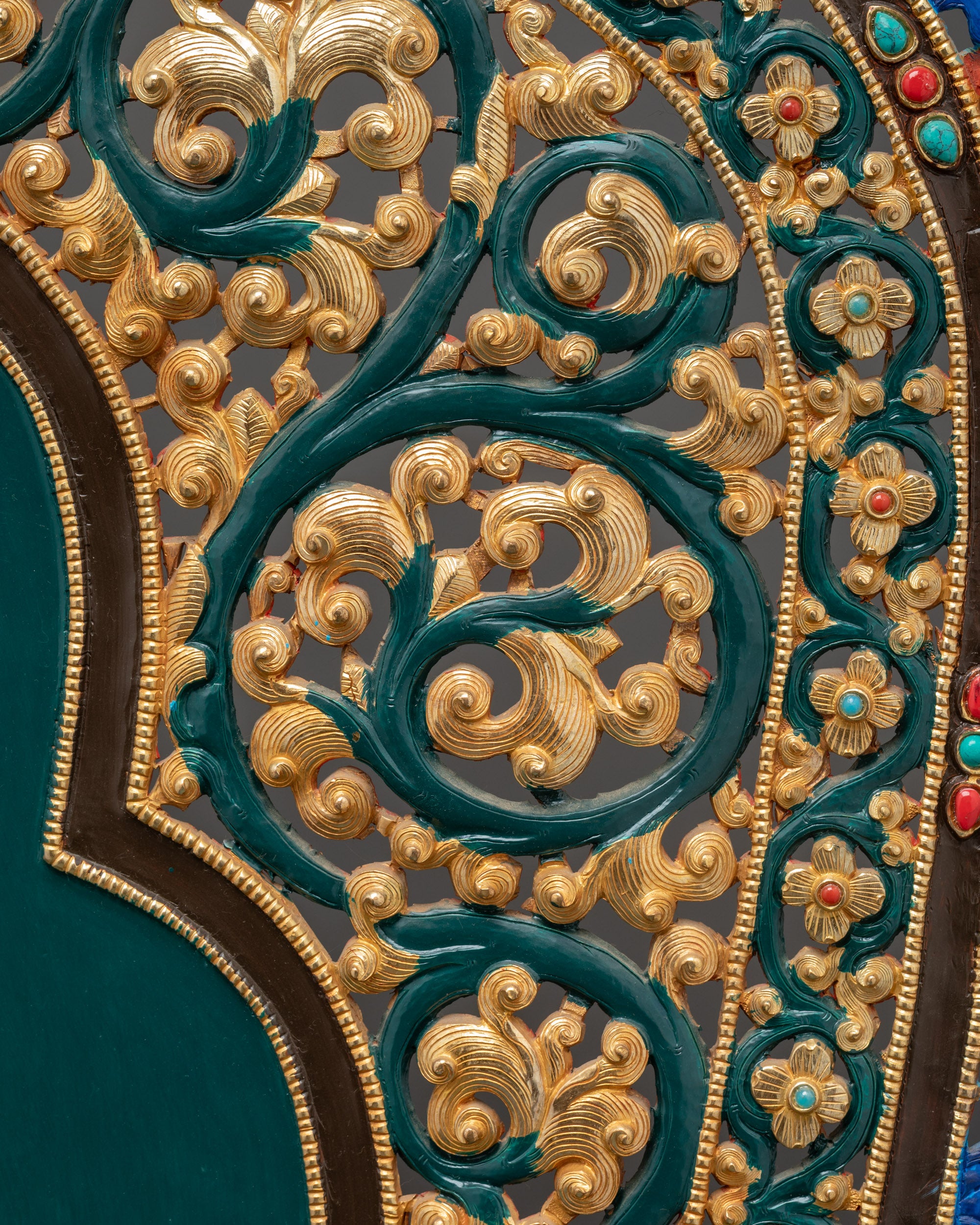 Tibetan ritual throne detailed close up showing semi precious stones and carving
