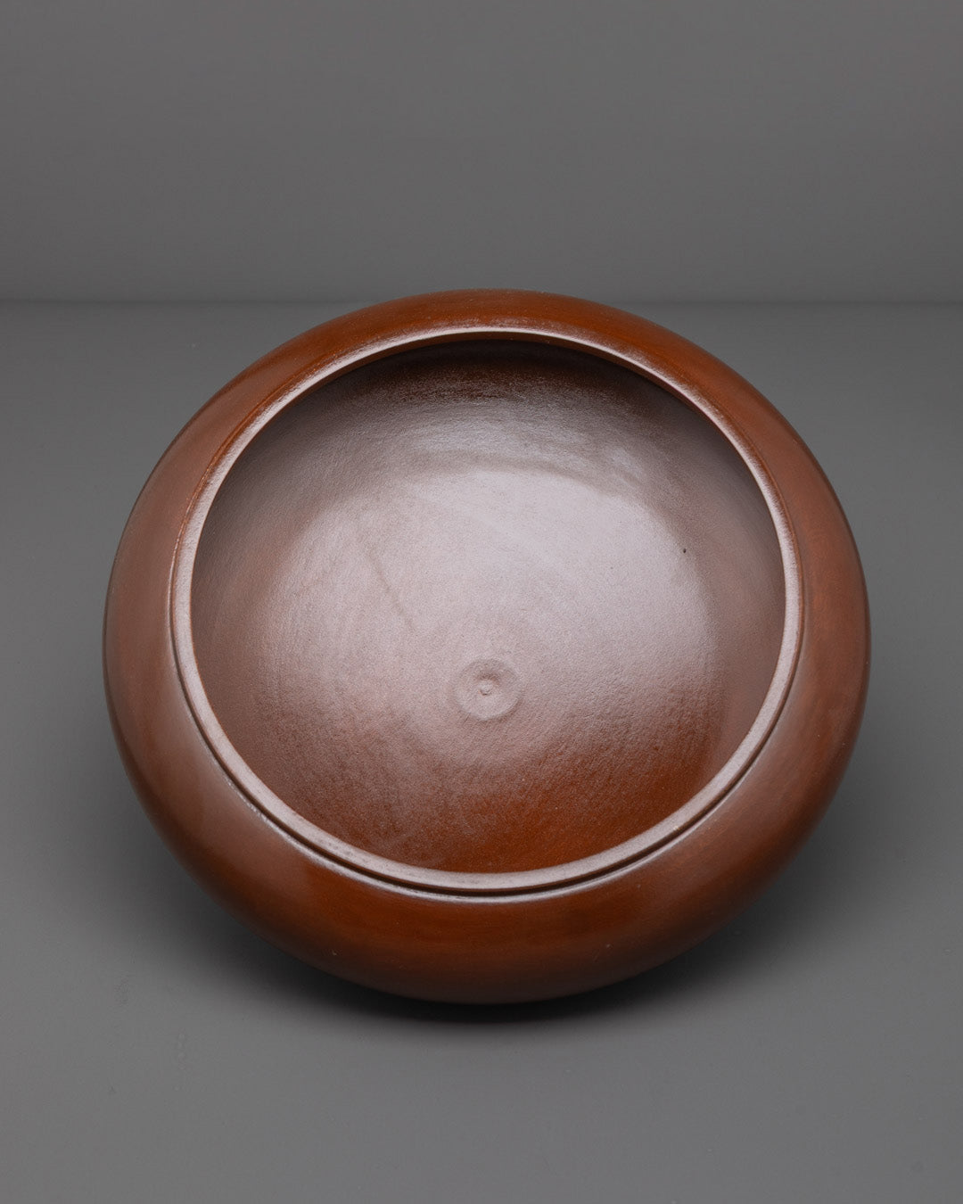 Top-down view showing detailed craftsmanship of Tibetan Paru wooden ritual bowl