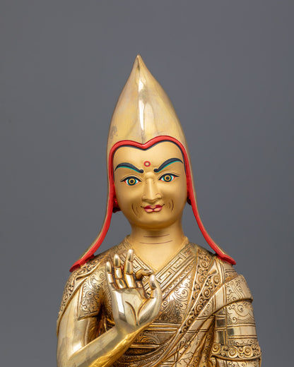 Top angle showing intricate carvings and vibrant acrylic colors on Je Tsongkhapa statue robes.