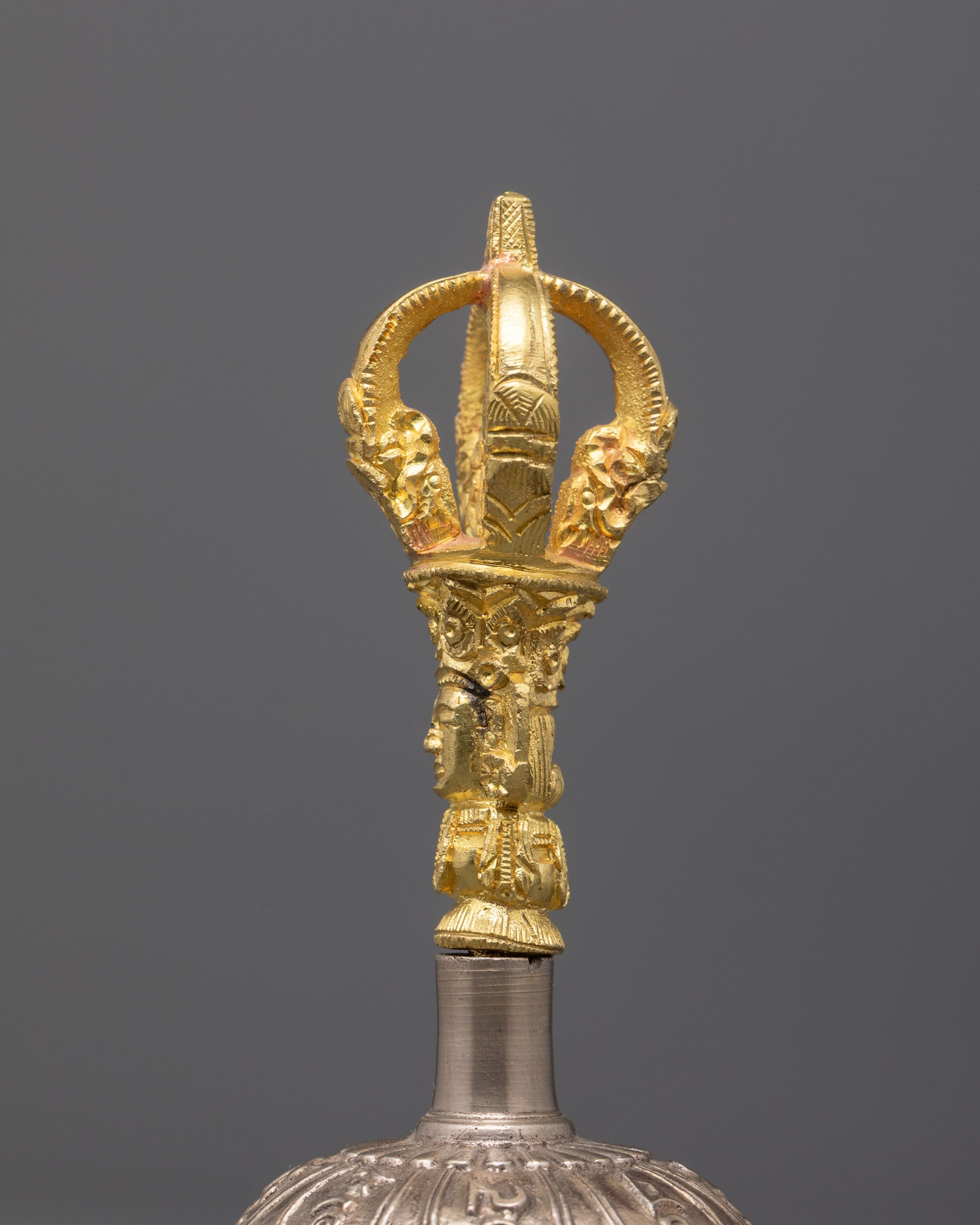 Top‑down shot of copper thunderbolt and bronze prayer bell with gold‑plated copper handle deity from Nepalese spiritual tools se