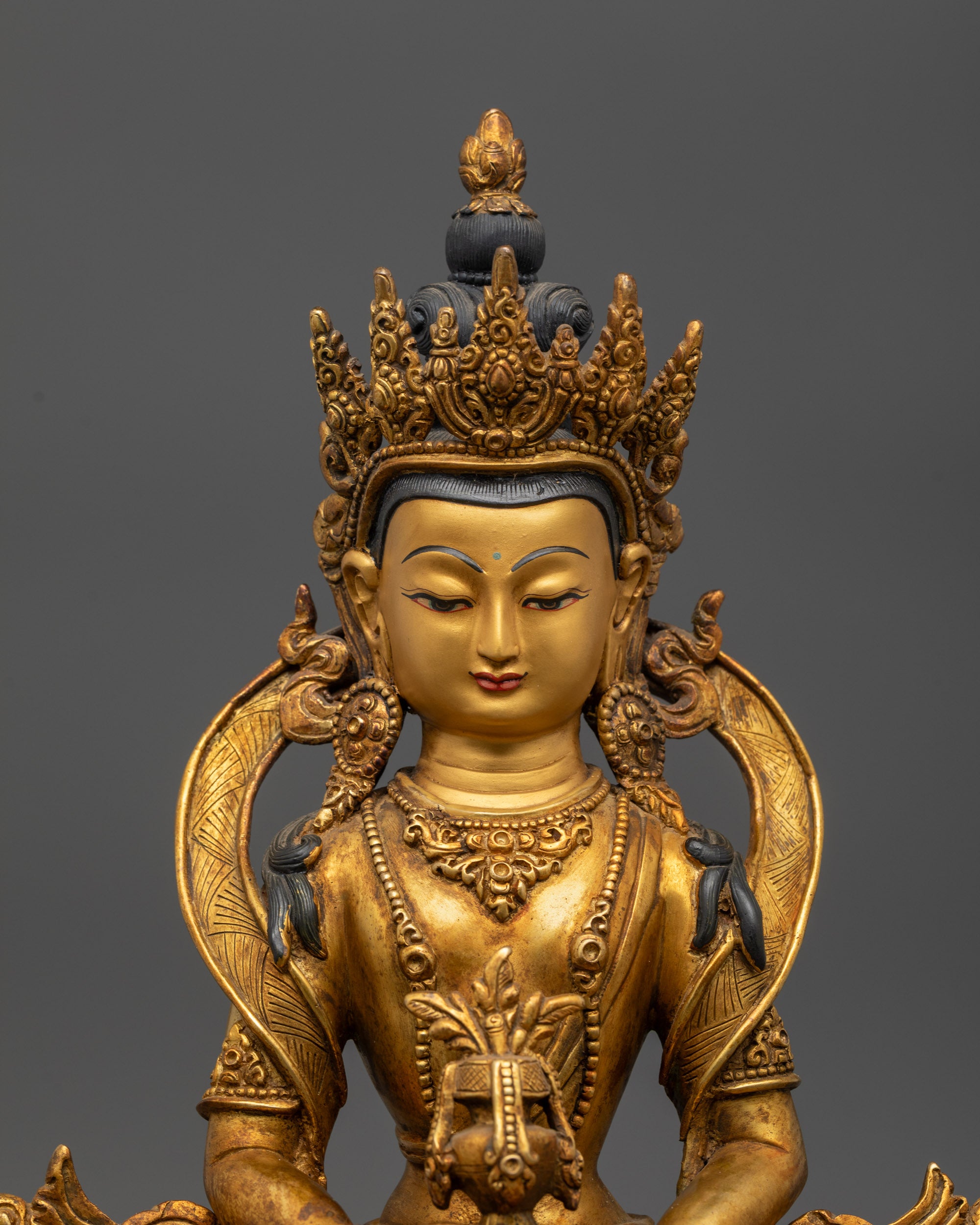 Top view Amitayus holding nectar vase with gold fire-gilded body and lotus seat